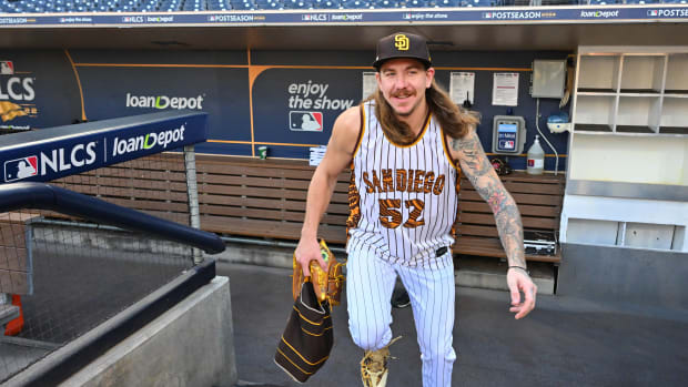 Oct 19, 2022; San Diego, California, USA; San Diego Padres starting pitcher Mike Clevinger (52) runs on the field for batting practice before the game against the Philadelphia Phillies during game two of the NLCS for the 2022 MLB Playoffs at Petco Park.