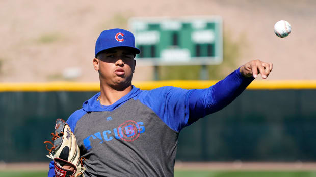 Feb 25, 2020; Mesa, Arizona, USA; Chicago Cubs pitcher Brailyn Marquez warms up during a spring training camp at Sloan Park.