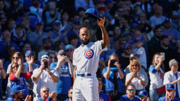 Oct 1, 2022; Chicago, Illinois, USA; Chicago Cubs Jason Heyward is being honored during a baseball game between the Chicago Cubs and Cincinnati Reds at Wrigley Field.