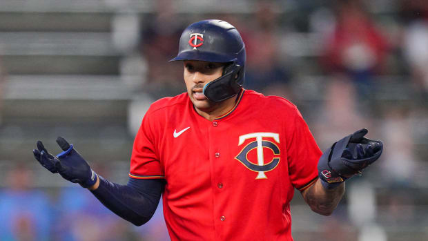 Sep 13, 2022; Minneapolis, Minnesota, USA; Minnesota Twins shortstop Carlos Correa (4) reacts to his double against the Kansas City Royals in the third inning at Target Field.