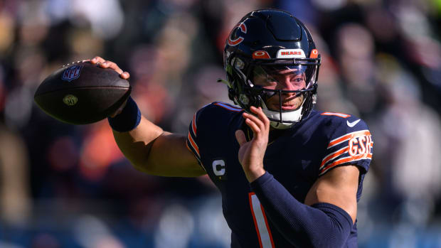 Dec 4, 2022; Chicago, Illinois, USA; Chicago Bears quarterback Justin Fields (1) passes the ball in the first quarter against the Green Bay Packers at Soldier Field.