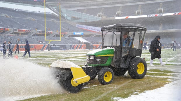Dec 24, 2017; Chicago, IL, USA; Snow is cleared from the field prior to a game between the Chicago Bears and the Cleveland Browns at Soldier Field.