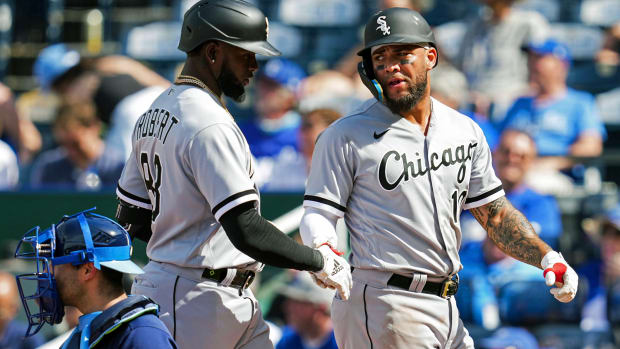 May 19, 2022; Kansas City, Missouri, USA; Chicago White Sox center fielder Luis Robert (88) is congratulated by third baseman Yoan Moncada (10) after hitting a home run during the eighth inning against the Kansas City Royals at Kauffman Stadium.