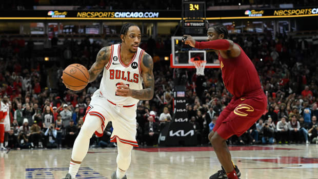 Dec 31, 2022; Chicago, Illinois, USA; Chicago Bulls forward DeMar DeRozan (11) dribbles the ball against Cleveland Cavaliers guard Caris LeVert (3) during the second half at United Center.
