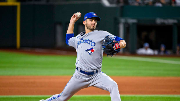Sep 11, 2022; Arlington, Texas, USA; Toronto Blue Jays relief pitcher Julian Merryweather (67) pitches against the Texas Rangers during the eighth inning at Globe Life Field.