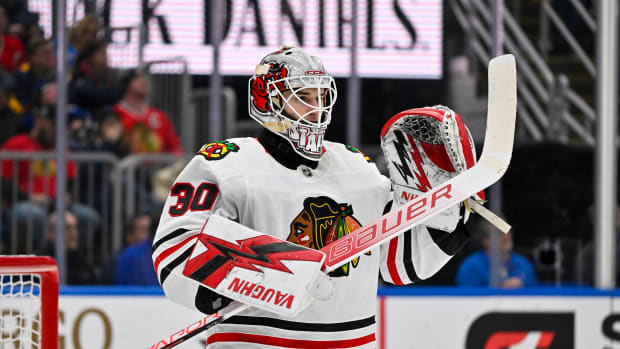 Bedard, Athanasiou lead Hawks to preseason opener win