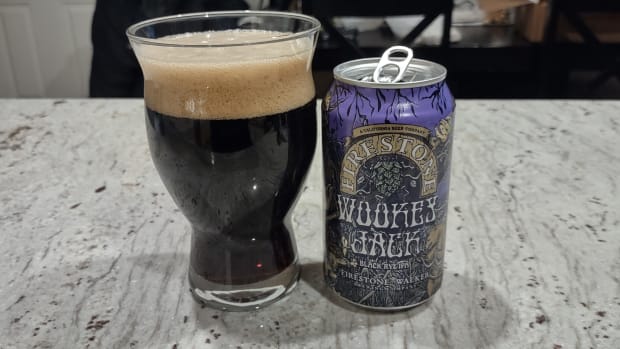 A Firestone Walker Wookey Jack can with the beer poured into a glass next to it