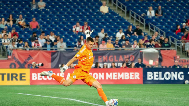 Chicago Fire FC goalkeeper Gabriel Slonina advances the ball up the field
