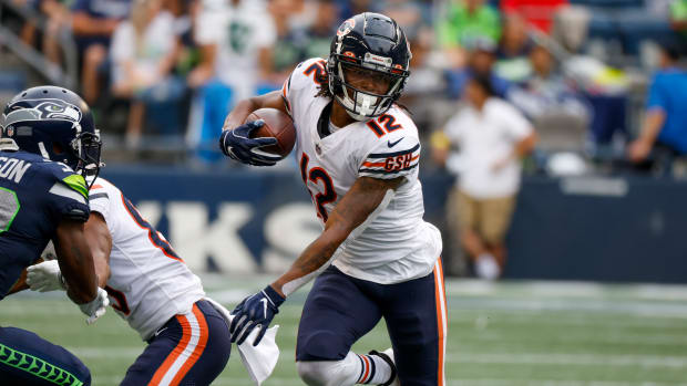 Aug 18, 2022; Seattle, Washington, USA; Chicago Bears wide receiver Velus Jones Jr. (12) runs for yards after the catch against the Seattle Seahawks during the second quarter at Lumen Field.