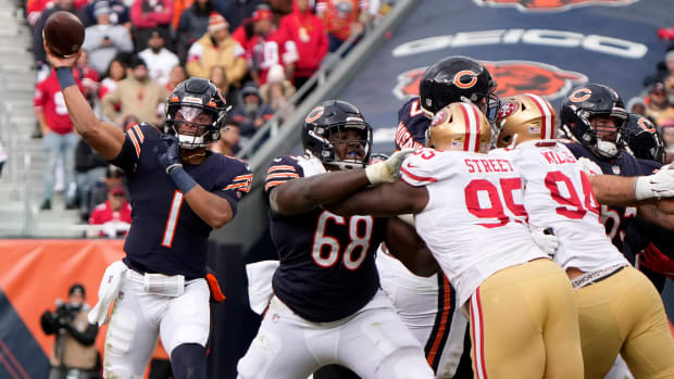 Oct 31, 2021; Chicago, Illinois, USA; Chicago Bears quarterback Justin Fields (1) throws a pass against the San Francisco 49ers during the second half at Soldier Field.