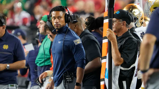 Sep 3, 2022; Columbus, Ohio, USA; Notre Dame Fighting Irish head coach Marcus Freeman watches from the sideline during the NCAA football game against the Ohio State Buckeyes at Ohio Stadium.