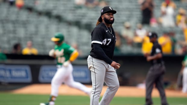 Sep 11, 2022; Oakland, California, USA; Chicago White Sox starting pitcher Johnny Cueto (47) waits while Oakland Athletics outfielder Ram n Laureano (22) runs out his two-run home run during the fifth inning at RingCentral Coliseum.
