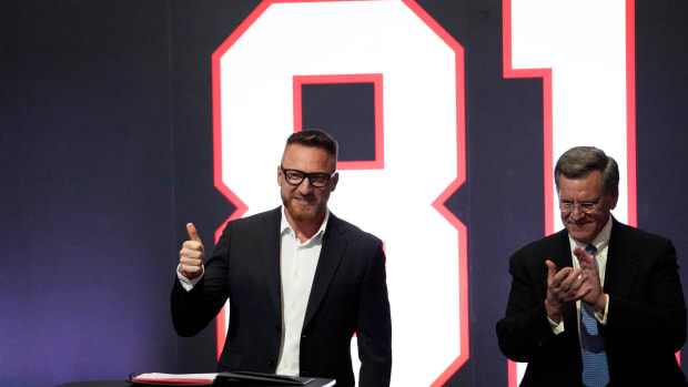 Apr 7, 2022; Chicago, Illinois, USA; The Chicago Blackhawks honor former Hawk Marian Hossa, (left) with Blackhawks Chairman Rock Wirtz, (right) at a ceremony where he signed a one day contract to retire as Blackhawk at United Center.