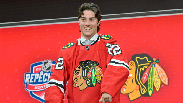 Jul 7, 2022; Montreal, Quebec, CANADA; Frank Nazar after being selected as the number thirteen overall pick to the Chicago Blackhawks in the first round of the 2022 NHL Draft at Bell Centre.