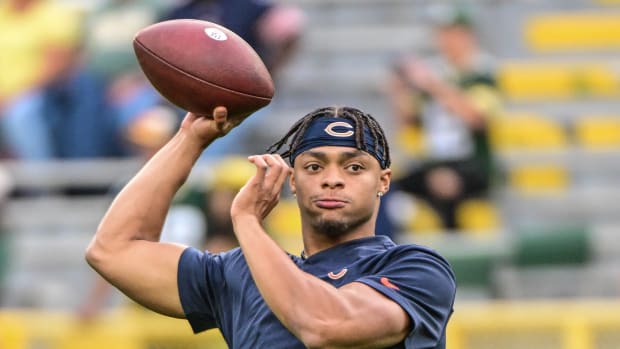 Sep 18, 2022; Green Bay, Wisconsin, USA; Chicago Bears quarterback Justin Fields (1) warms up before a game against the Green Bay Packers at Lambeau Field.