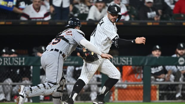 Sep 24, 2022; Chicago, Illinois, USA; Chicago White Sox outfielder AJ Pollock (18) is tagged out along the third base line by Detroit Tigers catcher Tucker Barnhart (15) after trying to score on an infield hit in the fourth inning at Guaranteed Rate Field.