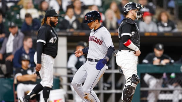Sep 22, 2022; Chicago, Illinois, USA; Cleveland Guardians left fielder Steven Kwan (38) scores against the Chicago White Sox during the fifth inning at Guaranteed Rate Field.