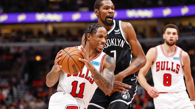 Nov 8, 2021; Chicago, Illinois, USA; Chicago Bulls forward DeMar DeRozan (11) drives to the basket against Brooklyn Nets forward Kevin Durant (7) during the first half at United Center.