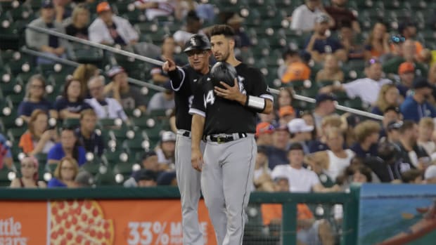 Sep 17, 2022; Detroit, Michigan, USA; Chicago White Sox third base coach Joe McEwing talks with catcher Seby Zavala (44) during a game against the Detroit Tigers at Comerica Park.