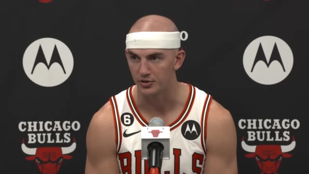 Alex Caruso speaks to reporters at his press conference during Chicago Bulls' media day 2022