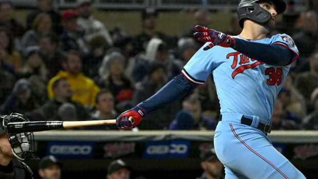 Sep 27, 2022; Minneapolis, Minnesota, USA; Minnesota Twins outfielder Matt Wallner (38) hits a two-run home run against the Chicago White Sox during the sixth inning at Target Field.