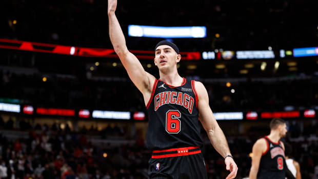 Jan 19, 2022; Chicago, Illinois, USA; Chicago Bulls guard Alex Caruso (6) reacts during the second half of NBA game against the Cleveland Cavaliers at United Center.