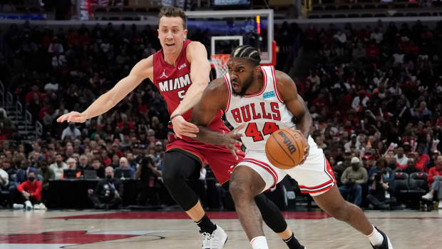 Apr 2, 2022; Chicago, Illinois, USA; Miami Heat guard Duncan Robinson (55) defends Chicago Bulls forward Patrick Williams (44) during the first half at United Center.