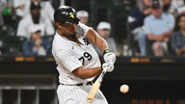 Aug 27, 2022; Chicago, Illinois, USA; Chicago White Sox infielder Jose Abreu (79) hits an RBI single in the eighth inning against the Arizona Diamondbacks at Guaranteed Rate Field.
