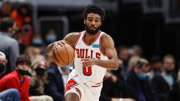 Jan 26, 2022; Chicago, Illinois, USA; Chicago Bulls guard Coby White (0) drives to the basket against the Toronto Raptors during the second half at United Center.