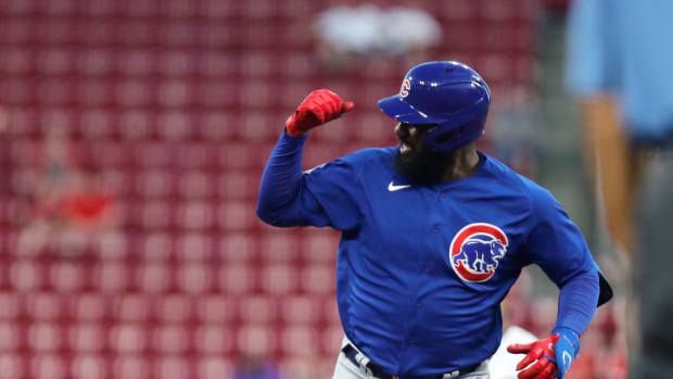 Oct 5, 2022; Cincinnati, Ohio, USA; Chicago Cubs designated hitter Franmil Reyes (32) reacts as he runs the bases after hitting a two-run home run against the Cincinnati Reds during the eighth inning at Great American Ball Park.