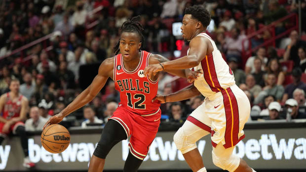 Oct 19, 2022; Miami, Florida, USA; Miami Heat guard Kyle Lowry (7) defends Chicago Bulls guard Ayo Dosunmu (12) in the first half at FTX Arena.
