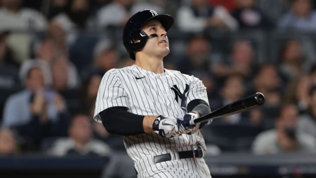 Oct 11, 2022; Bronx, New York, USA; New York Yankees first baseman Anthony Rizzo (48) hits a home run during the sixth inning against the Cleveland Guardians in game one of the ALDS for the 2022 MLB Playoffs at Yankee Stadium.