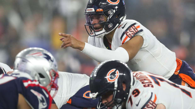 Oct 24, 2022; Foxborough, Massachusetts, USA; Chicago Bears quarterback Justin Fields (1) reacts during the second half against the New England Patriots at Gillette Stadium.