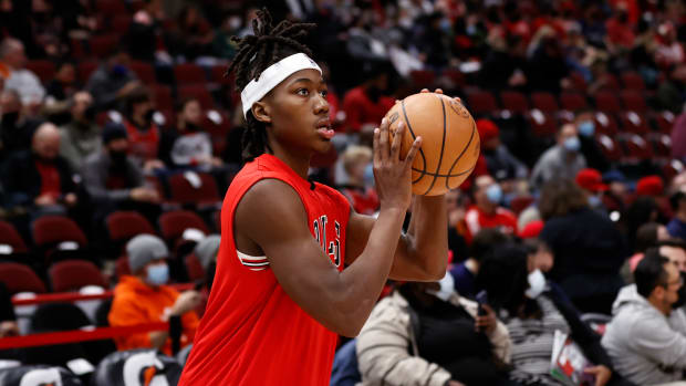 Jan 3, 2022; Chicago, Illinois, USA; Chicago Bulls guard Ayo Dosunmu (12) warms up before an NBA game against the Orlando Magic at United Center.