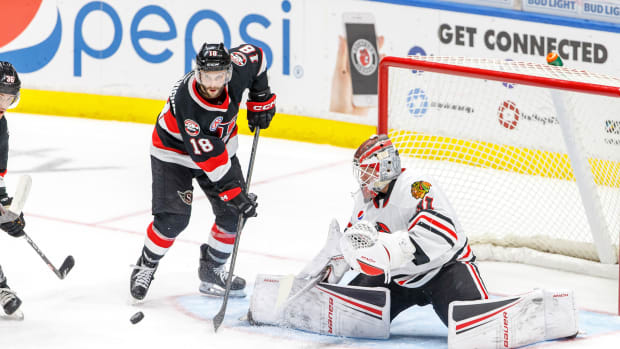 Rockford IceHogs goalie Dylan Wells tracks the puck in a game against the Belleville Senators.