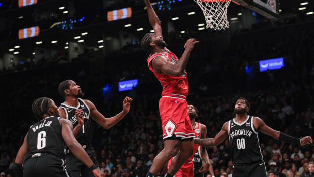 Nov 1, 2022; Brooklyn, New York, USA; Chicago Bulls forward Patrick Williams (44) rebounds during the second half in front of Brooklyn Nets forward David Duke Jr. (6) and forward Kevin Durant (7) and forward Royce O'Neale (00) at Barclays Center.