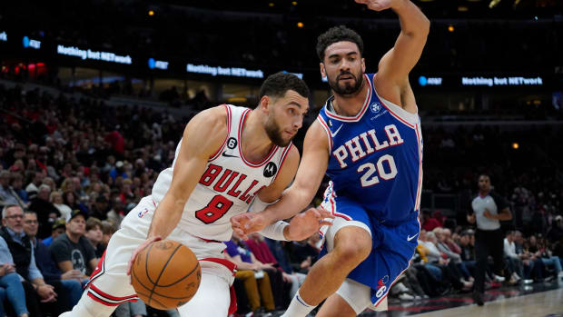 Oct 29, 2022; Chicago, Illinois, USA; Chicago Bulls guard Zach LaVine (8) drives to the basket against Philadelphia 76ers forward Georges Niang (20) during the first half at United Center.