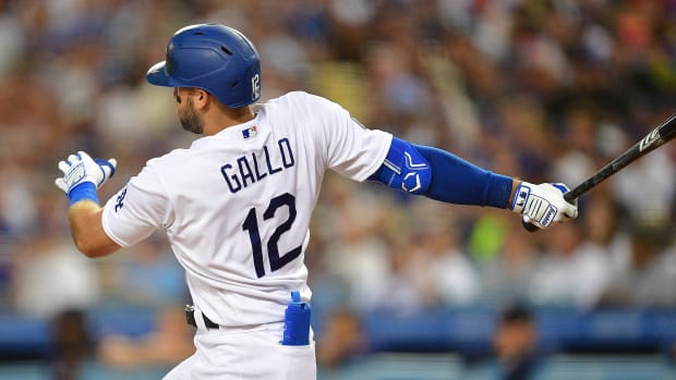 Aug 9, 2022; Los Angeles, California, USA; Los Angeles Dodgers left fielder Joey Gallo (12) hits a double against the Minnesota Twins during the second inning at Dodger Stadium.