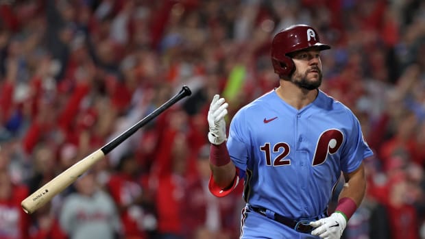 Nov 3, 2022; Philadelphia, Pennsylvania, USA; Philadelphia Phillies left fielder Kyle Schwarber (12) hits a solo home run against the Houston Astros during the first inning in game five of the 2022 World Series at Citizens Bank Park.