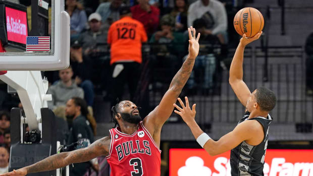 Oct 28, 2022; San Antonio, Texas, USA; San Antonio Spurs forward Keldon Johnson (3) shoots over Chicago Bulls center Andre Drummond (3) during the first half at AT&T Center.