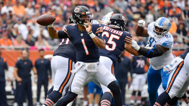 Oct 3, 2021; Chicago, Illinois, USA; Chicago Bears quarterback Justin Fields (1) passes the football in the first half against the Detroit Lions at Soldier Field.