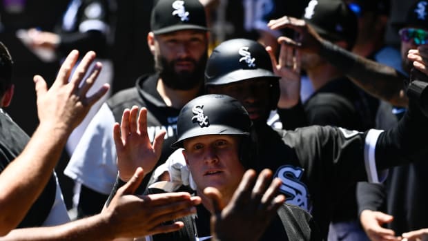 Jul 9, 2022; Chicago, Illinois, USA; Chicago White Sox designated hitter Andrew Vaughn (25) and Chicago White Sox center fielder Luis Robert (88) celebrate in the dugout after scoring against the Detroit Tigers during the second inning at Guaranteed Rate Field.