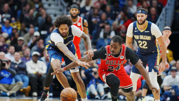 Nov 16, 2022; New Orleans, Louisiana, USA; New Orleans Pelicans forward Brandon Ingram (14) fights for the ball against Chicago Bulls forward Javonte Green (24) during the fourth quarter at Smoothie King Center.