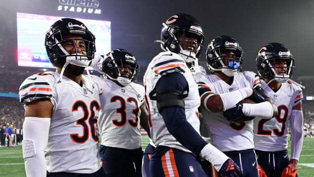 Oct 24, 2022; Foxborough, Massachusetts, USA; Chicago Bears safety DeAndre Houston-Carson (36), cornerback Jaylon Johnson (33), defensive end Dominique Robinson (91), safety Jaquan Brisker (9), and cornerback Dane Cruikshank (29) celebrate after an interception against the New England Patriots during the first half at Gillette Stadium.