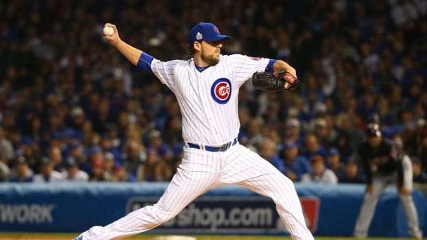 Oct 29, 2016; Chicago, IL, USA; Chicago Cubs starting pitcher John Lackey (41) delivers a pitch during the second inning in game four of the 2016 World Series against the Cleveland Indians at Wrigley Field.