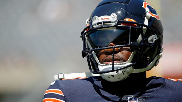 Aug 14, 2021; Chicago, Illinois, USA; Chicago Bears cornerback Jaylon Johnson (33) walks on the field during warmups before the game against the Miami Dolphins at Soldier Field.