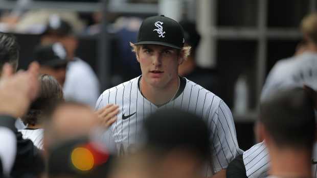 Apr 17, 2024; Chicago, Illinois, USA; Chicago White Sox starting pitcher Jonathan Cannon (48) is greeted by teammates in the dugout after the first inning of his MLB debut during game one of a doubleheader against the Kansas City Royals at Guaranteed Rate Field.