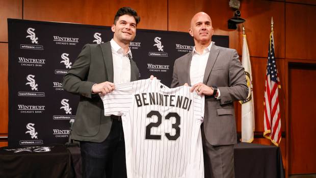 Jan 4, 2023; Chicago, Illinois, USA; Chicago White Sox manager Pedro Grifol (right) poses with free-agent outfielder Andrew Benintendi (left) during a press conference at Guaranteed Rate Field.