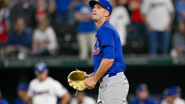 Mar 28, 2024; Arlington, Texas, USA; Chicago Cubs starting pitcher Drew Smyly (11) pitches in relief against the Texas Rangers during the tenth inning at Globe Life Field.