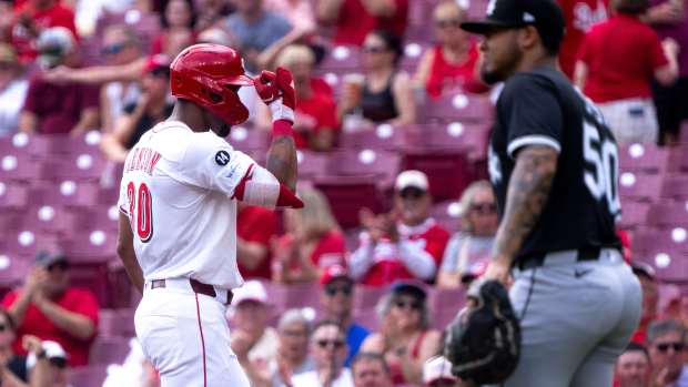 Cincinnati Reds outfielder Will Benson (30) gestures after reaching first on a 2-run RBI single in the first inning of the MLB game between Cincinnati Reds and Chicago White Sox at Great American Ball Park in Cincinnati on Thursday, May 15, 2025.